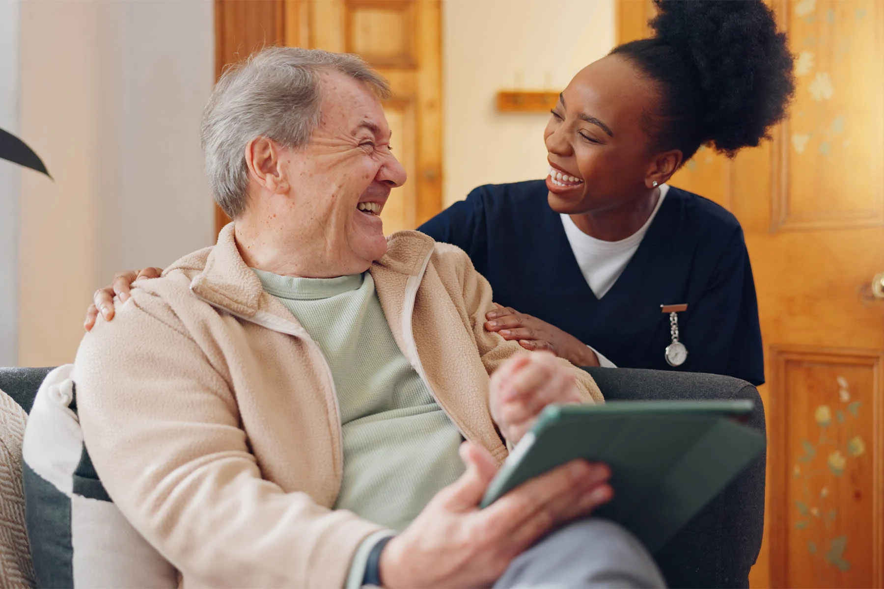 Nurse smiling with senior